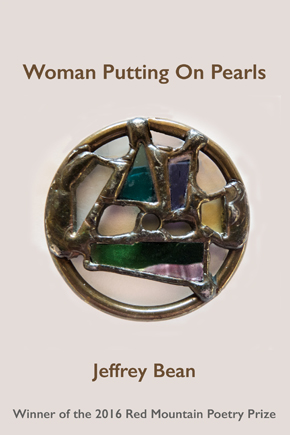 Woman Putting on Pearls