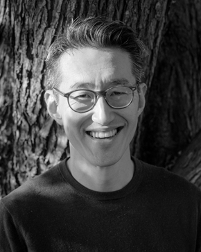 Black and white photo of author Chaney Kwak